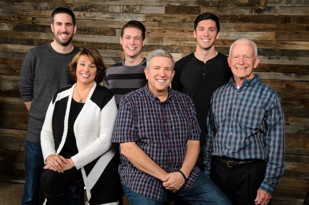 group portrait family business professionals headshot arvada